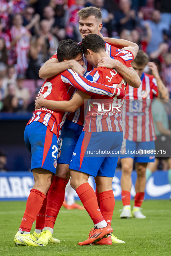 Alexander Sorloth of Atletico de Madrid (C) celebrates his goal with Julian Alvarez (R) and Giuliano Simeone (L) during the La Liga EA Sport...