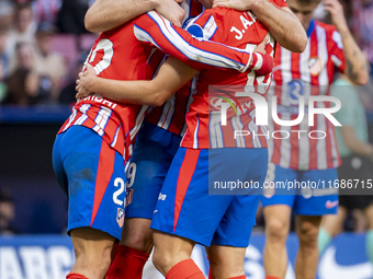 Alexander Sorloth of Atletico de Madrid (C) celebrates his goal with Julian Alvarez (R) and Giuliano Simeone (L) during the La Liga EA Sport...