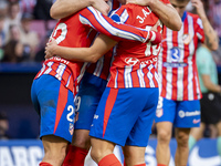 Alexander Sorloth of Atletico de Madrid (C) celebrates his goal with Julian Alvarez (R) and Giuliano Simeone (L) during the La Liga EA Sport...