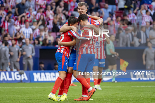 Alexander Sorloth of Atletico de Madrid (C) celebrates his goal with Julian Alvarez (R) and Giuliano Simeone (L) during the La Liga EA Sport...