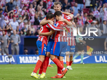 Alexander Sorloth of Atletico de Madrid (C) celebrates his goal with Julian Alvarez (R) and Giuliano Simeone (L) during the La Liga EA Sport...