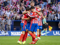 Alexander Sorloth of Atletico de Madrid (C) celebrates his goal with Julian Alvarez (R) and Giuliano Simeone (L) during the La Liga EA Sport...