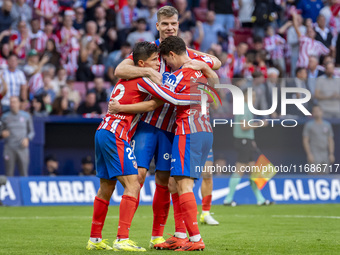 Alexander Sorloth of Atletico de Madrid (C) celebrates his goal with Julian Alvarez (R) and Giuliano Simeone (L) during the La Liga EA Sport...