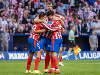 Alexander Sorloth of Atletico de Madrid (C) celebrates his goal with Julian Alvarez (R) and Giuliano Simeone (L) during the La Liga EA Sport...