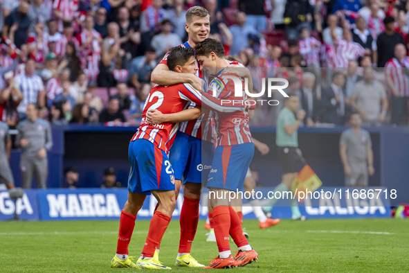 Alexander Sorloth of Atletico de Madrid (C) celebrates his goal with Julian Alvarez (R) and Giuliano Simeone (L) during the La Liga EA Sport...