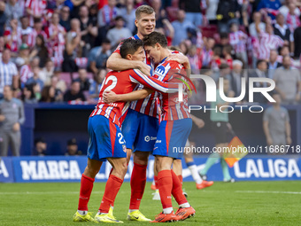 Alexander Sorloth of Atletico de Madrid (C) celebrates his goal with Julian Alvarez (R) and Giuliano Simeone (L) during the La Liga EA Sport...