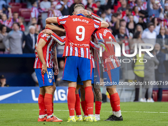 Alexander Sorloth of Atletico de Madrid (C) celebrates his goal with his teammates during the La Liga EA Sports 2024/25 football match betwe...