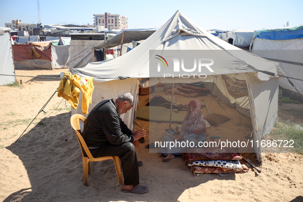 Displaced Palestinians are seen in a temporary camp in Khan Yunis, Gaza Strip, on October 20, 2024, amid the ongoing war in the Palestinian...