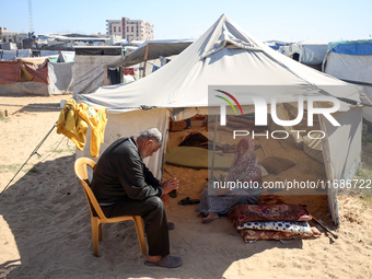 Displaced Palestinians are seen in a temporary camp in Khan Yunis, Gaza Strip, on October 20, 2024, amid the ongoing war in the Palestinian...