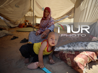 Displaced Palestinians are seen in a temporary camp in Khan Yunis, Gaza Strip, on October 20, 2024, amid the ongoing war in the Palestinian...