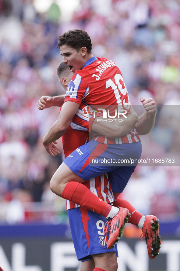 Alexander Sorloth of Atletico de Madrid and Julian Alvarez of Atletico de Madrid celebrate a goal during the La Liga 2024/25 match between A...