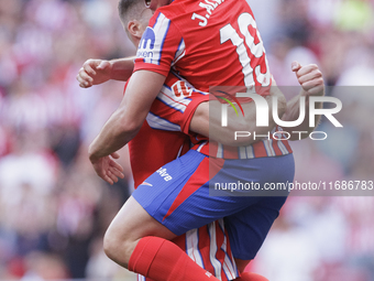 Alexander Sorloth of Atletico de Madrid and Julian Alvarez of Atletico de Madrid celebrate a goal during the La Liga 2024/25 match between A...