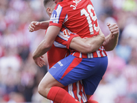 Alexander Sorloth of Atletico de Madrid and Julian Alvarez of Atletico de Madrid celebrate a goal during the La Liga 2024/25 match between A...