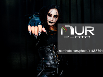 Cosplayer Lucy from New Jersey dresses as Eric Draven of the Crow for New York Comic Con at the Javits Center in New York City, on October 1...