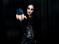 Cosplayer Lucy from New Jersey dresses as Eric Draven of the Crow for New York Comic Con at the Javits Center in New York City, on October 1...