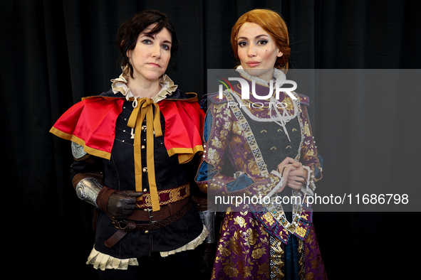 Cosplayers Mia and Amelia dress as characters from Witcher 3 Blood and Wine DLC for New York Comic Con at the Javits Center in New York City...