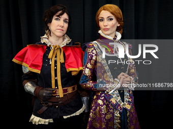 Cosplayers Mia and Amelia dress as characters from Witcher 3 Blood and Wine DLC for New York Comic Con at the Javits Center in New York City...