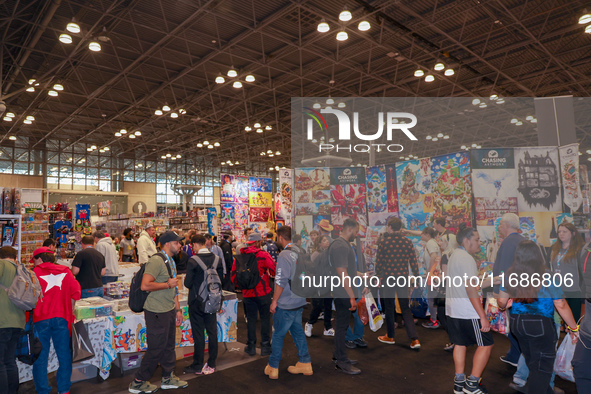 People attend the New York Comic Con 2024 at the Jacob Javits Center in New York City, United States, on October 19, 2024. New York Comic Co...