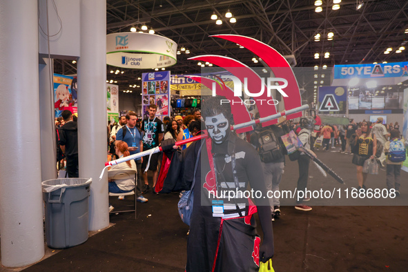 A cosplayer poses for a photo in the photo cruise showroom at New York Comic Con 2024 at the Jacob Javits Center in New York City, United St...