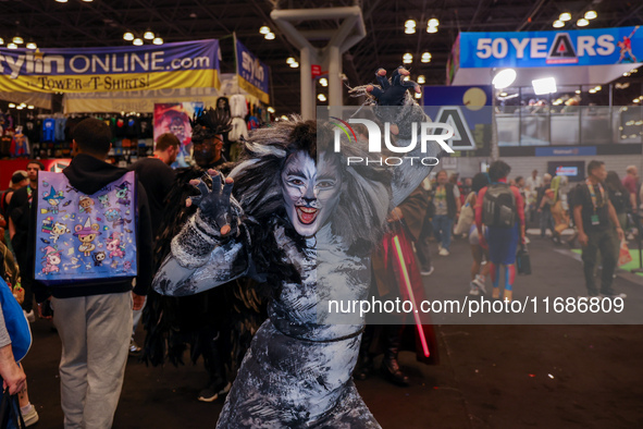 A cosplayer poses for a photo in the photo cruise showroom at New York Comic Con 2024 at the Jacob Javits Center in New York City, United St...