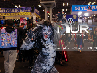 A cosplayer poses for a photo in the photo cruise showroom at New York Comic Con 2024 at the Jacob Javits Center in New York City, United St...