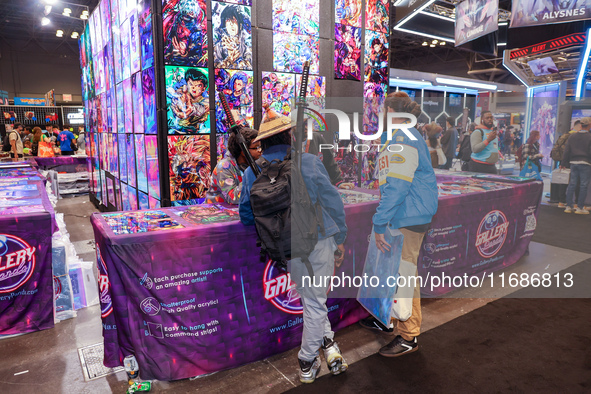 People attend the New York Comic Con 2024 at the Jacob Javits Center in New York City, United States, on October 19, 2024. New York Comic Co...