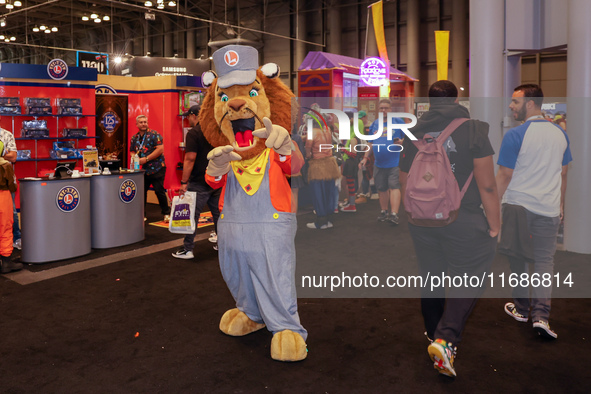 People attend the New York Comic Con 2024 at the Jacob Javits Center in New York City, United States, on October 19, 2024. New York Comic Co...