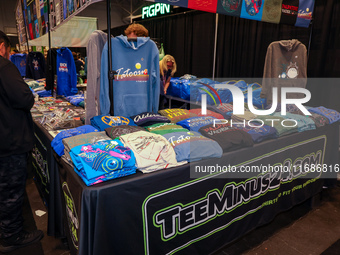 People attend the New York Comic Con 2024 at the Jacob Javits Center in New York City, United States, on October 19, 2024. New York Comic Co...