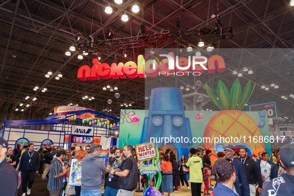 People attend the New York Comic Con 2024 at the Jacob Javits Center in New York City, United States, on October 19, 2024. New York Comic Co...