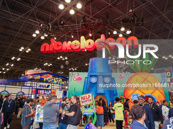 People attend the New York Comic Con 2024 at the Jacob Javits Center in New York City, United States, on October 19, 2024. New York Comic Co...