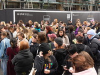 A hundred fans of former One Direction member Liam Payne gather to hold a memorial tribute at Dom Square following the death of the singer i...