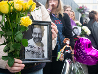 A hundred fans of former One Direction member Liam Payne gather to hold a memorial tribute at Dom Square following the death of the singer i...