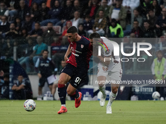 Roberto Piccoli (#91 Cagliari Calcio) and Sebastian Walukiewicz (Torino FC) participate in the Serie A TIM match between Cagliari Calcio and...