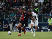 Roberto Piccoli (#91 Cagliari Calcio) and Sebastian Walukiewicz (Torino FC) participate in the Serie A TIM match between Cagliari Calcio and...