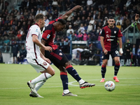 Yerry Mina (#26 Cagliari Calcio) and Antonio Sanabria (Torino FC) participate in the Serie A TIM match between Cagliari Calcio and Torino FC...