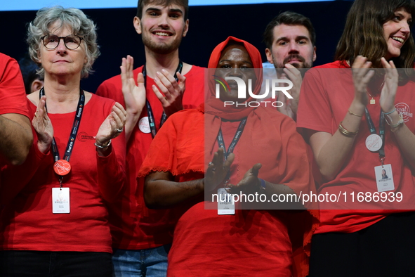 Volunteers participate in the closing night of the Lyon Light Festival in Lyon, France, on October 20, 2024. 