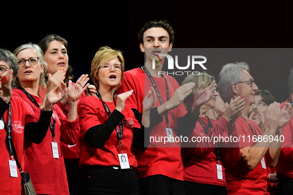 Volunteers participate in the closing night of the Lyon Light Festival in Lyon, France, on October 20, 2024. 