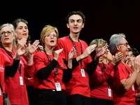 Volunteers participate in the closing night of the Lyon Light Festival in Lyon, France, on October 20, 2024. (