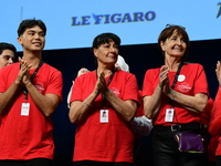 Volunteers participate in the closing night of the Lyon Light Festival in Lyon, France, on October 20, 2024. (