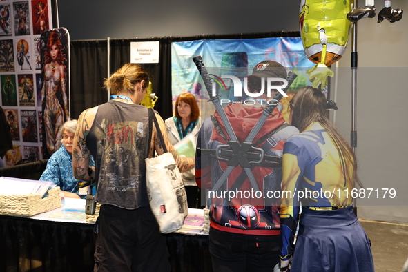 People check out the New York Comic Con 2024 at the Jacob Javits Center in New York City, United States, on October 20, 2024. New York Comic...