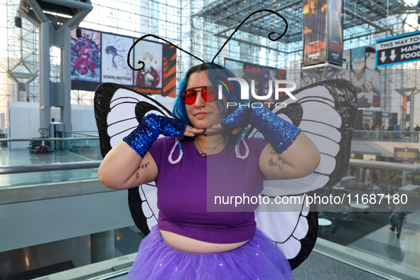 Meghan from Brooklyn creates a Butterfree from Pokemon for New York Comic Con at the Javits Center in New York City, on October 20, 2024. 