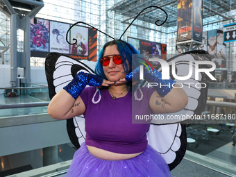 Meghan from Brooklyn creates a Butterfree from Pokemon for New York Comic Con at the Javits Center in New York City, on October 20, 2024. (