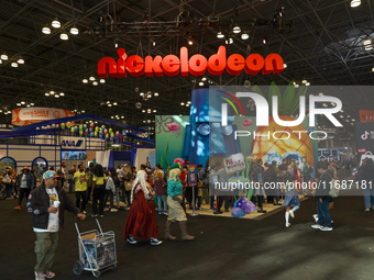 People check out the New York Comic Con 2024 at the Jacob Javits Center in New York City, United States, on October 20, 2024. New York Comic...