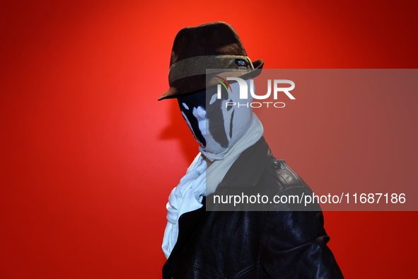 Marcus from Queens dresses as Rorschach from Watchmen for New York Comic Con at the Javits Center in New York City, on October 20, 2024. 