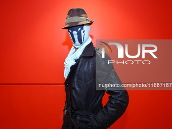 Marcus from Queens dresses as Rorschach from Watchmen for New York Comic Con at the Javits Center in New York City, on October 20, 2024. (