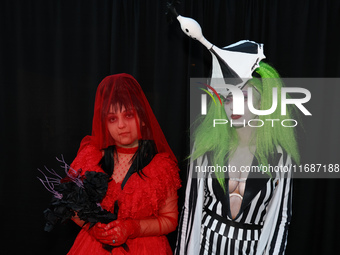 Manon and Jatabi from New York City dress as characters from Beetlejuice for New York Comic Con at the Javits Center in New York City, on Oc...