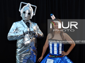 Joe and Lauren from Long Island dress as TARDIS and a Cyberman from Doctor Who for New York Comic Con at the Javits Center in New York City,...