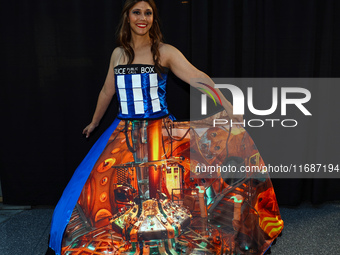 Joe and Lauren from Long Island dress as TARDIS and a Cyberman from Doctor Who for New York Comic Con at the Javits Center in New York City,...