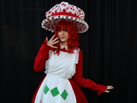 Cosplayer Sophie from New York dresses as Strawberry Shortcake, the 1980 version, for New York Comic Con at the Javits Center in New York Ci...