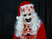 A cosplayer dresses as a real bad Santa for New York Comic Con at the Javits Center in New York City, on October 20, 2024. (